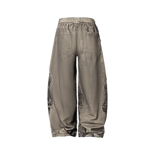 2025New American High Street Irregular Ripped Patchwork Niche Design Casual Scimitar Pants for Men and Women